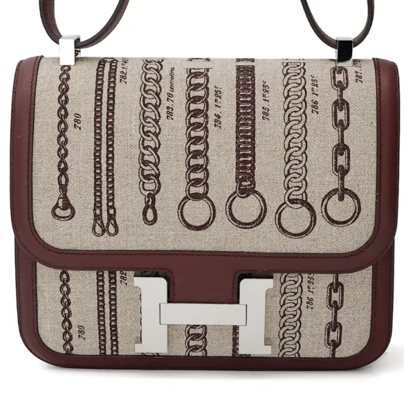 HERMèS Limited Edition Constance Toile de Camp 24 Dechainee shoulder bag in Canvas and Bordeaux Swift leather with Palladium hardware