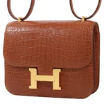 HERMèS Matte Alligator Constance Mini 19 shoulder bag in Gold with Gold hardware