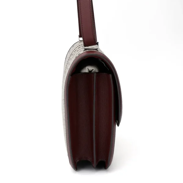 HERMèS Limited Edition Constance Toile de Camp 24 Dechainee shoulder bag in Canvas and Bordeaux Swift leather with Palladium hardware