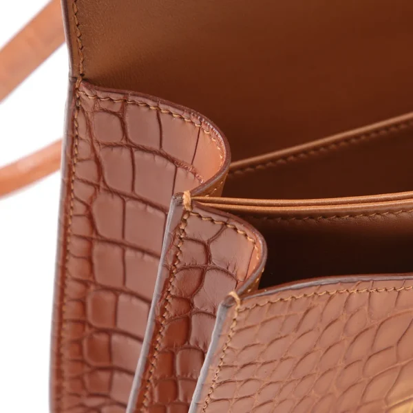HERMèS Matte Alligator Constance Mini 19 shoulder bag in Gold with Gold hardware