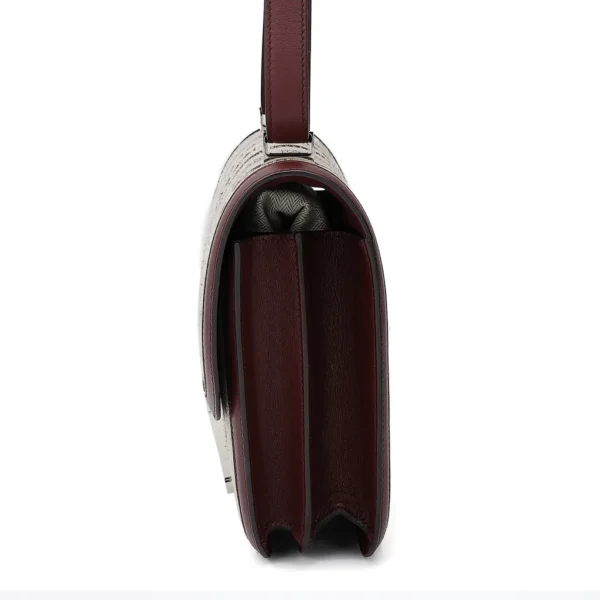 HERMèS Limited Edition Constance Toile de Camp 24 Dechainee shoulder bag in Canvas and Bordeaux Swift leather with Palladium hardware