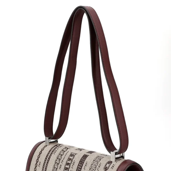 HERMèS Limited Edition Constance Toile de Camp 24 Dechainee shoulder bag in Canvas and Bordeaux Swift leather with Palladium hardware