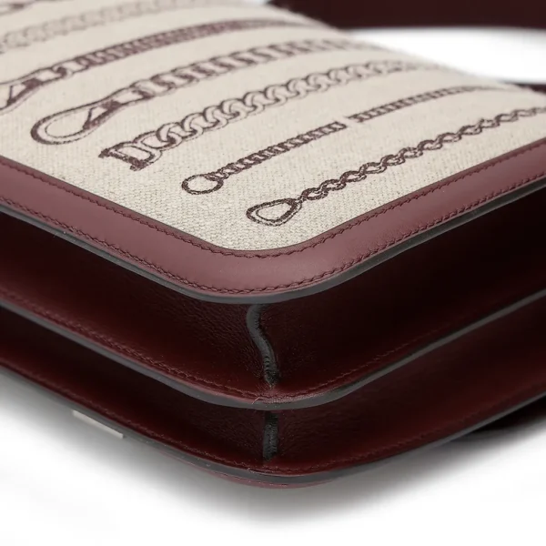 HERMèS Limited Edition Constance Toile de Camp 24 Dechainee shoulder bag in Canvas and Bordeaux Swift leather with Palladium hardware