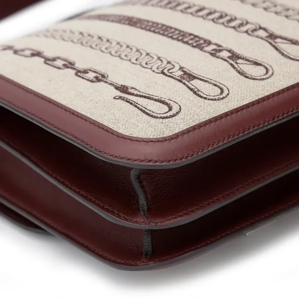 HERMèS Limited Edition Constance Toile de Camp 24 Dechainee shoulder bag in Canvas and Bordeaux Swift leather with Palladium hardware