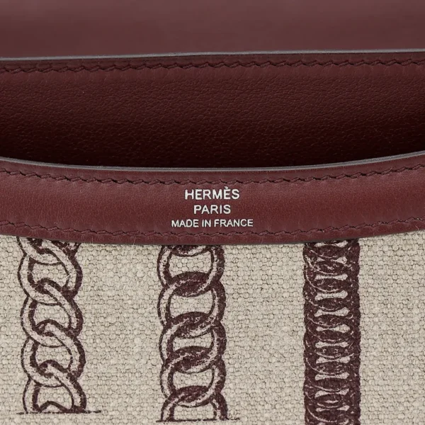 HERMèS Limited Edition Constance Toile de Camp 24 Dechainee shoulder bag in Canvas and Bordeaux Swift leather with Palladium hardware