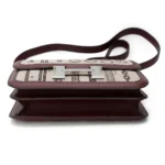 HERMèS Limited Edition Constance Toile de Camp 24 Dechainee shoulder bag in Canvas and Bordeaux Swift leather with Palladium hardware