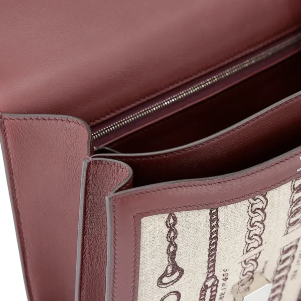 HERMèS Limited Edition Constance Toile de Camp 24 Dechainee shoulder bag in Canvas and Bordeaux Swift leather with Palladium hardware