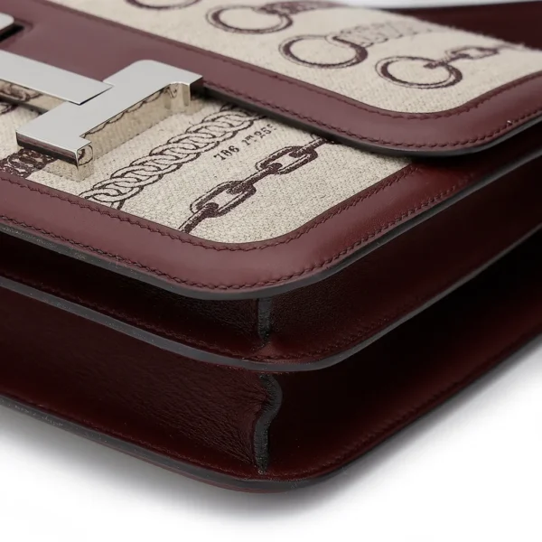 HERMèS Limited Edition Constance Toile de Camp 24 Dechainee shoulder bag in Canvas and Bordeaux Swift leather with Palladium hardware